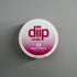 diip black cherry 4 nicotine-free dip pouch can laying on a white background