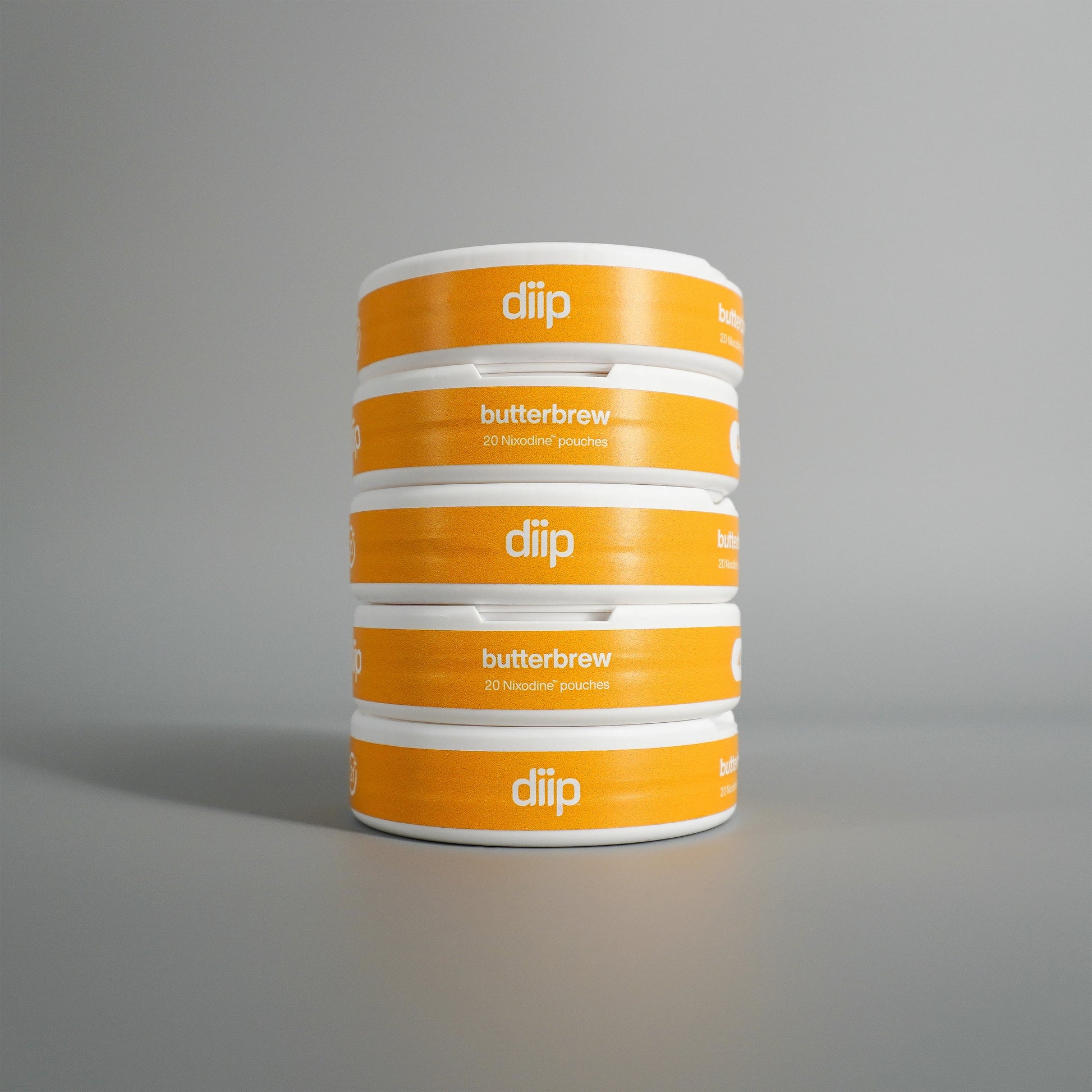 diip butterbrew 4 nicotine-free dip pouch cans standing upright in front of a white background