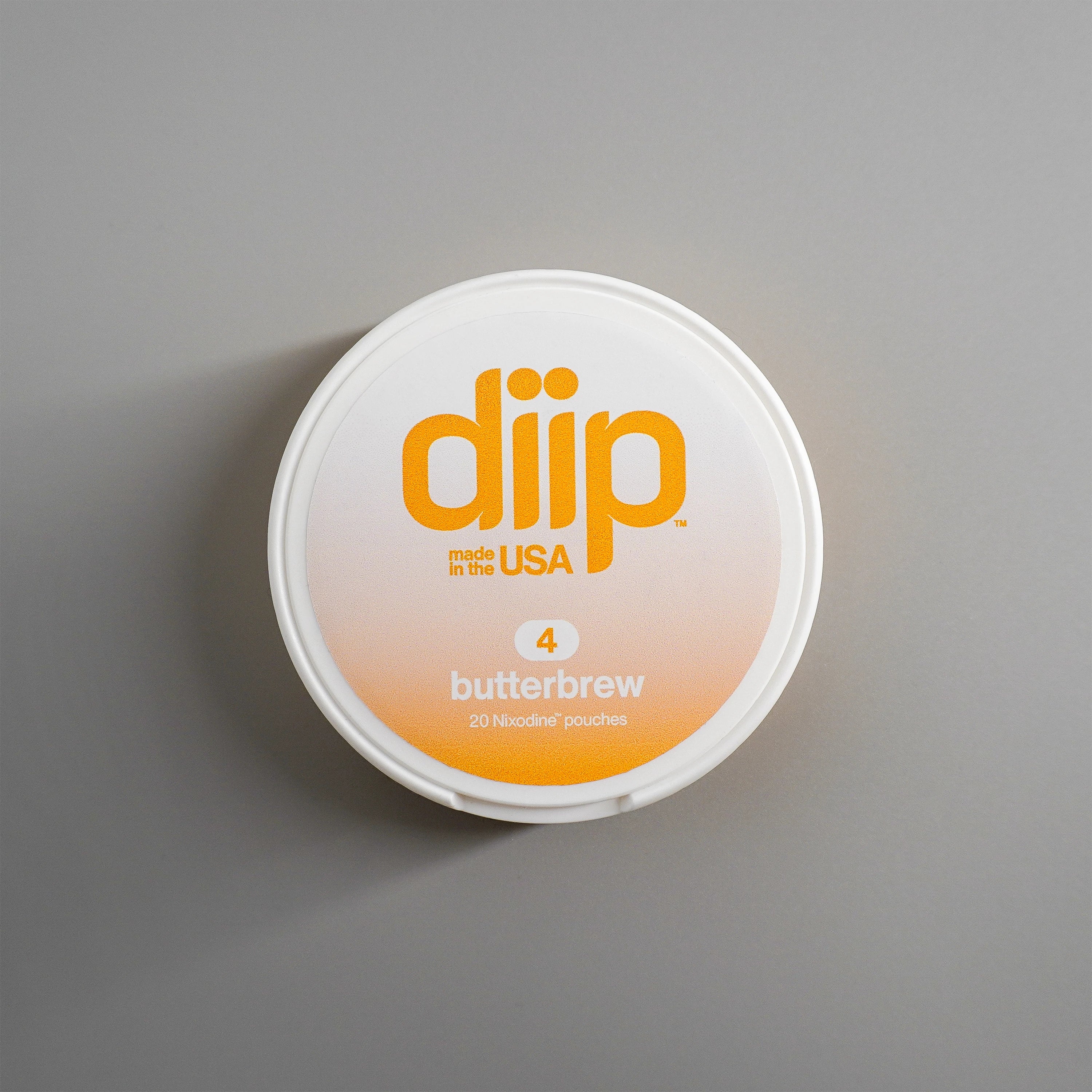 diip butterbrew 4 nicotine-free dip pouch can laying on a white background