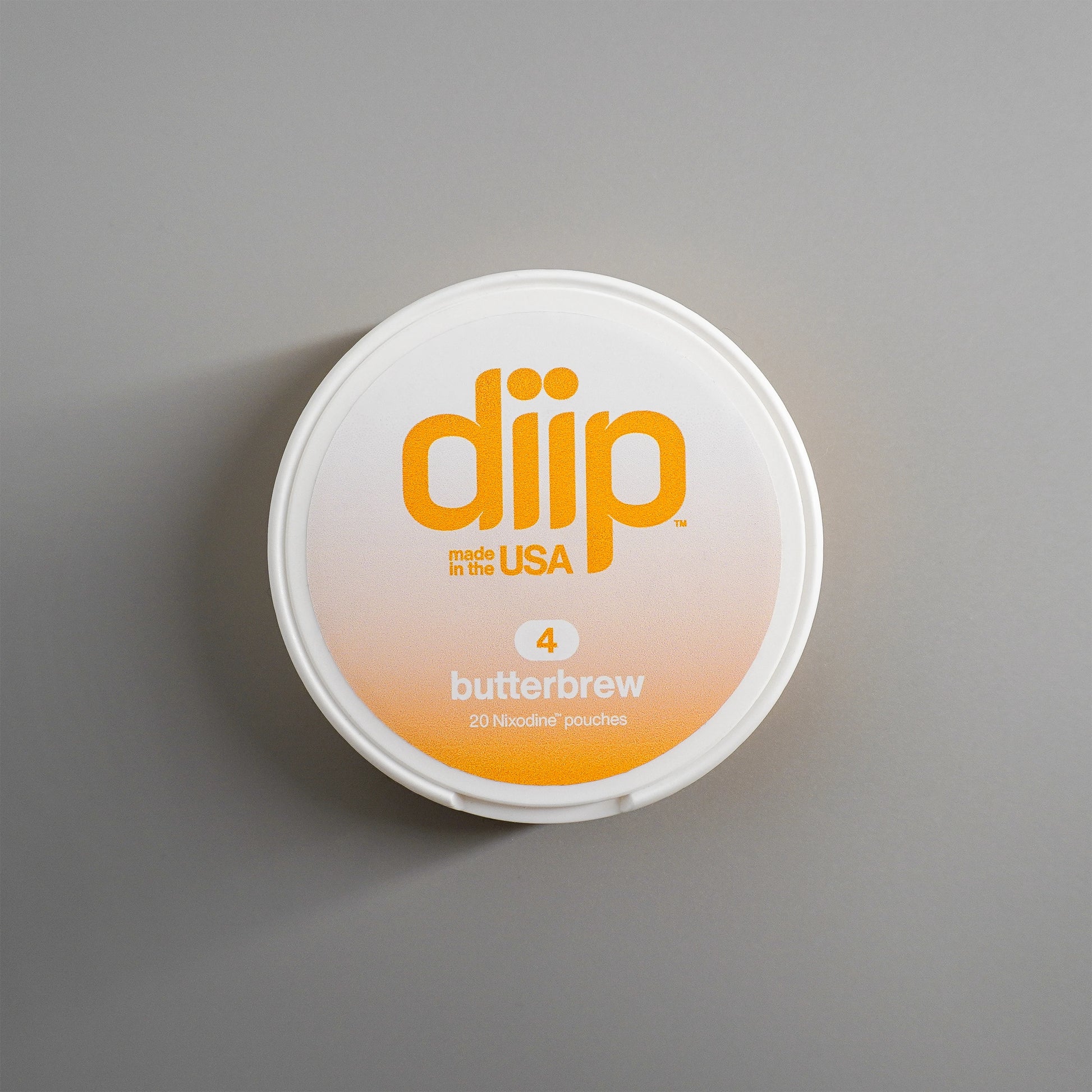 diip butterbrew 4 nicotine-free dip pouch can laying on a white background