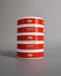 diip cinnamon 4 nicotine-free dip pouch cans standing upright in front of a white background