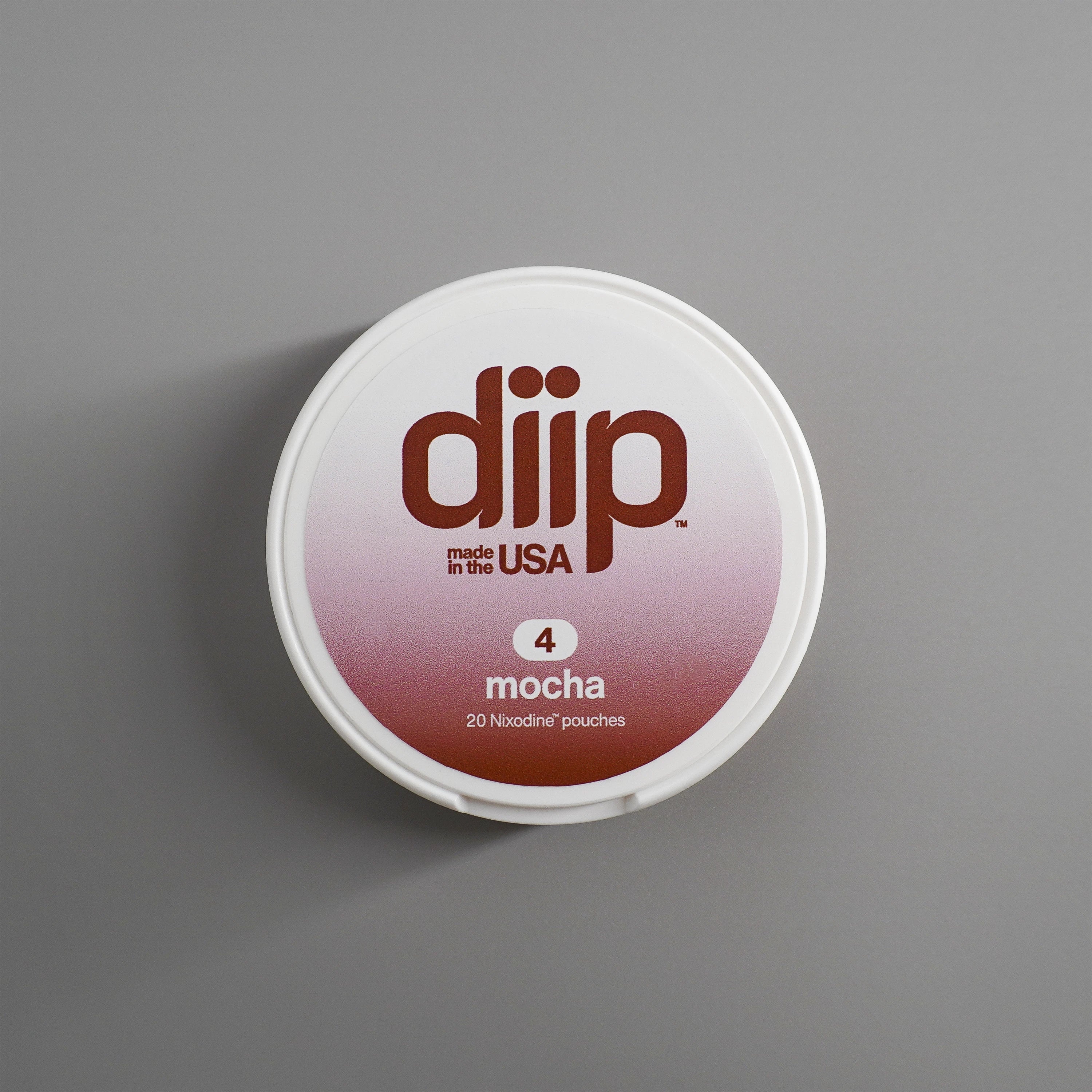 diip mocha 4 nicotine-free dip pouch can laying on a white background