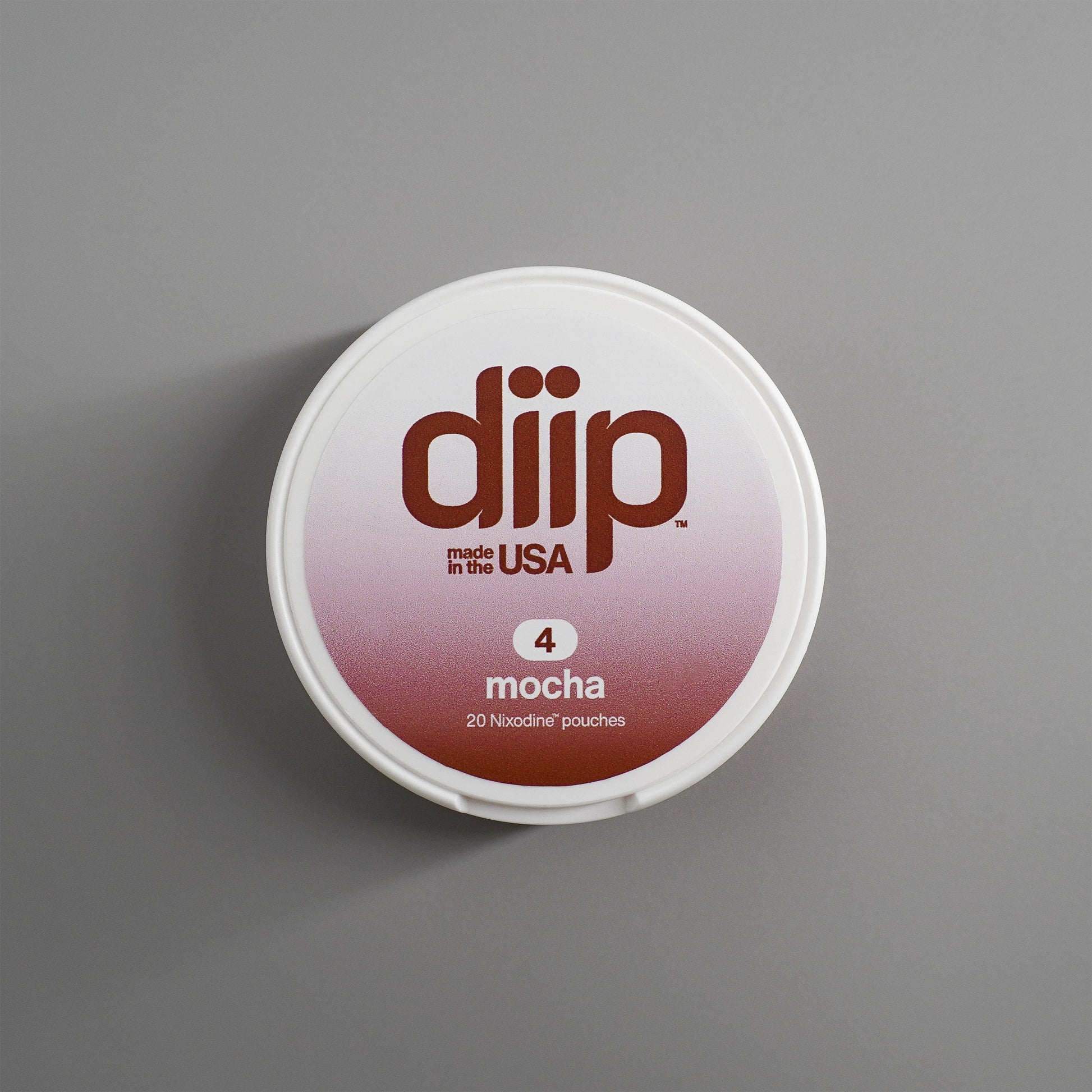 diip mocha 4 nicotine-free dip pouch can laying on a white background