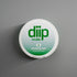 diip wintergreen 4 nicotine-free dip pouch can laying on a white background
